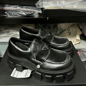 Prada Black Leather Lug-Sole Penny Loafers